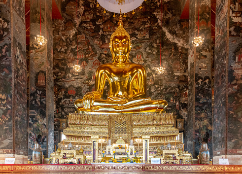 The Buddha statue at Wat Suthat in Bangkok Thailand
