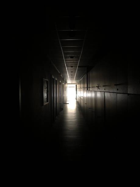 istock Dark Corridor with Light Beam Stock Photo 1351994206