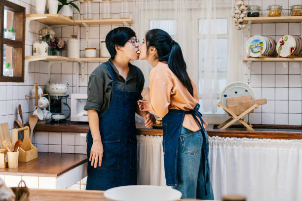 istock LGBT couple is preparing their breakfast in the kitchen 1351995219