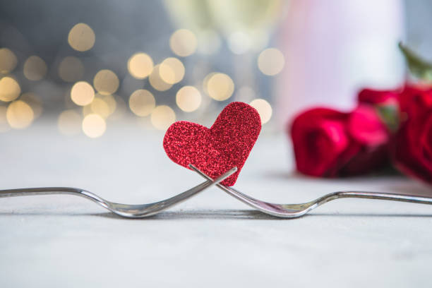 istock Forks and a heart. Holiday menu for Valentines Day. 1351998356