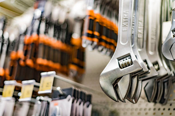 Tools put up for sale in a hardware store Tools put up for sale in a hardware store adjustable wrench photos stock pictures, royalty-free photos & images