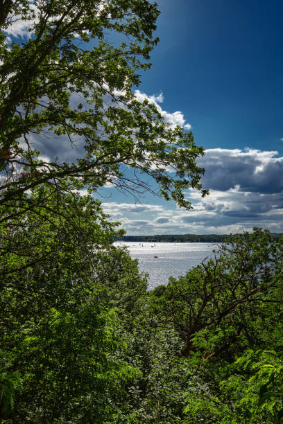 istock The afternoon sun puts glittering backlight onto river Havel. 1352002878