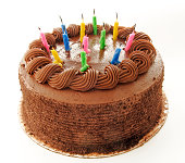 Birthday chocolate cake with colorful candles