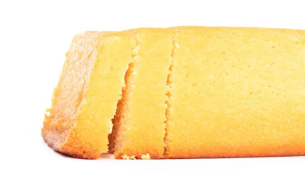 Traditional homemade sliced buttercake, isolated on a white background