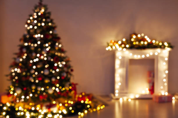 istock Christmas tree lights light garlands new year's eve presents 1352004872