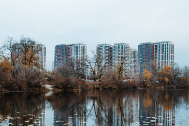 istock Lake on Osokorki with skyscrapers in the background 1352006080