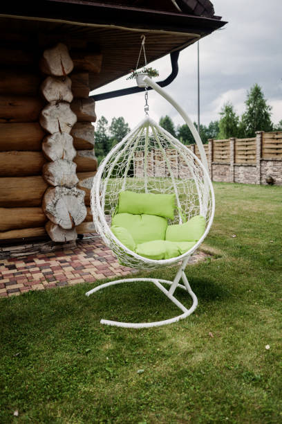 istock garden with hanging chair 1352006376
