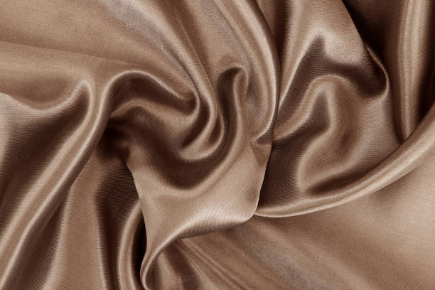 istock Dark brown fabric texture background, detail of silk or linen pattern. 1352007836