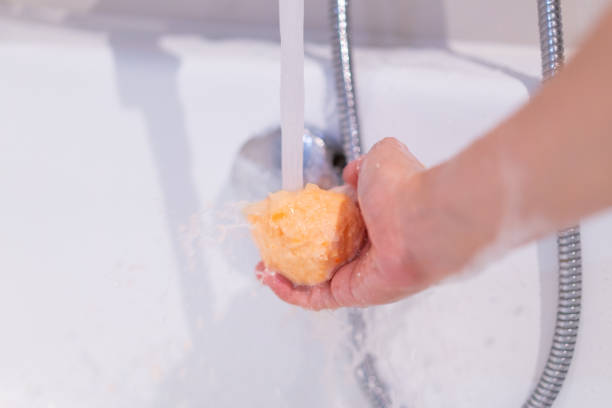 istock Woman holding a bath bomb. 1352009265