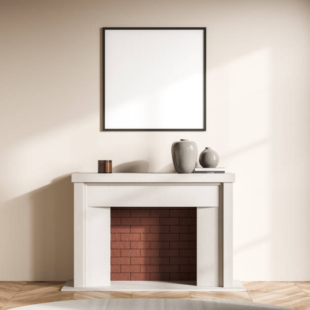 istock Empty square canvas on beige living room wall and fireplace 1352010146