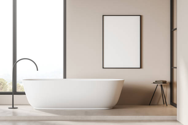 istock White bathtub in light bathroom interior with window, mockup poster 1352010175