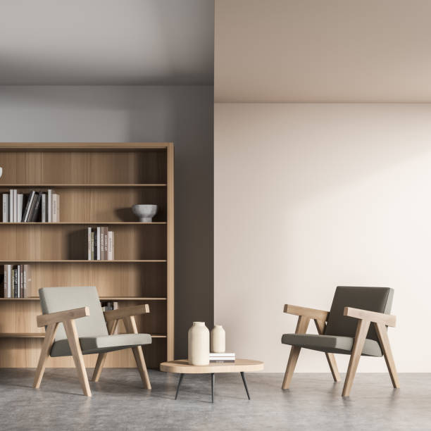 istock Two beige armchairs in living room with bookcase 1352012321