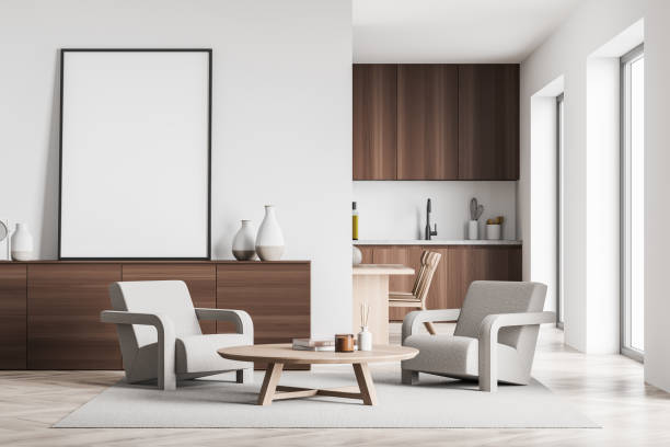 istock Standing canvas next to white wall in beige seating area and kitchen 1352012352