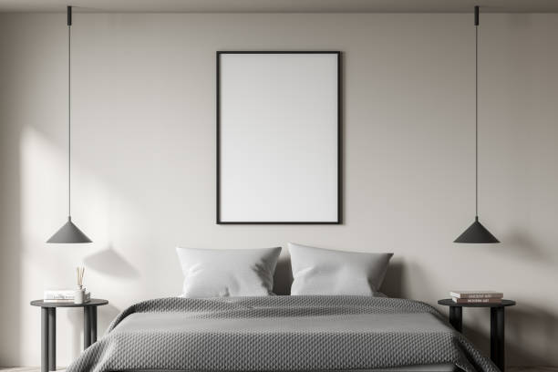 istock Light bedroom interior with bed and linens, mockup poster 1352015042