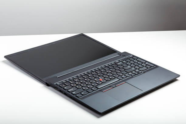 istock Convertible laptop open. Empty open laptop with mockup on white desk table with black screen. minimalist work space with modern Convertible notebook. Laptop screen template for website digital design 1352019917