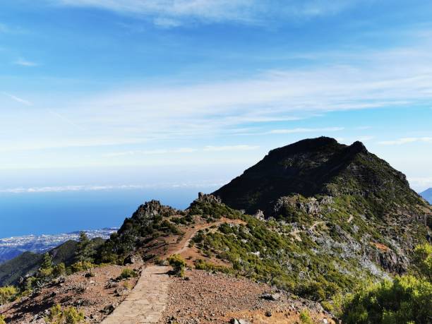istock Path on a mountain with big rocks and stones 1352020725
