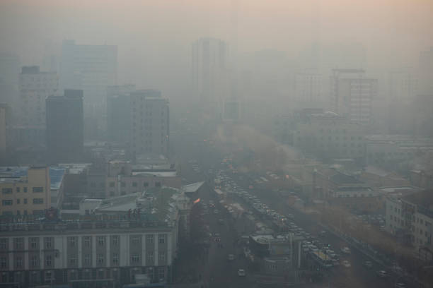 winter in Ulaanbaatar ir pollution and climate change are closely linked. Some pollutants, such as black carbon and methane (both short-lived climate pollutants) contribute directly to air pollution and climate change, and many sources of greenhouse gases (GHGs) are also sources of air pollutants. In Mongolia, this is also the case, coal consumption by households, and for power generation, as well as emissions from industry, agriculture and road transport are the major source both of GHGs, short-lived climate pollutants (SLCPs), and other air pollutants. smog car stock pictures, royalty-free photos & images