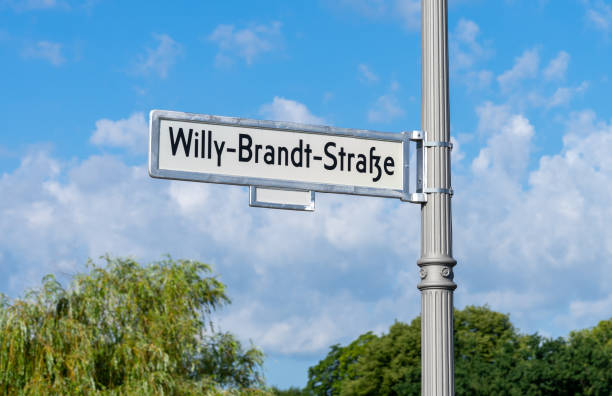 Low Angle View Of Information Sign Against Sky