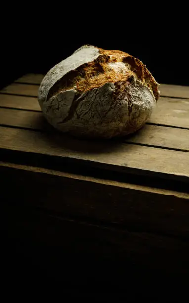 freshly baked homemade bread on an old wooden crate