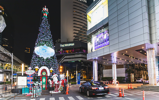 Christmas tree decorations in front of Terminal 21 Department Store at Asoke Junction Sukhumvit road Bangkok Thailand, November 5, 2021