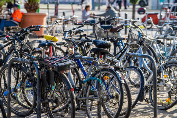 istock Bicycles Parked In Parking Lot 1352034045
