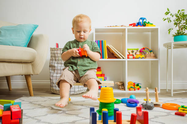 istock Boy Playing With Toy At Home 1352040367