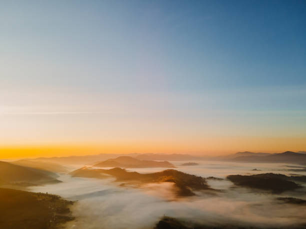 istock aerial view of sunrise above mountain range 1352040543