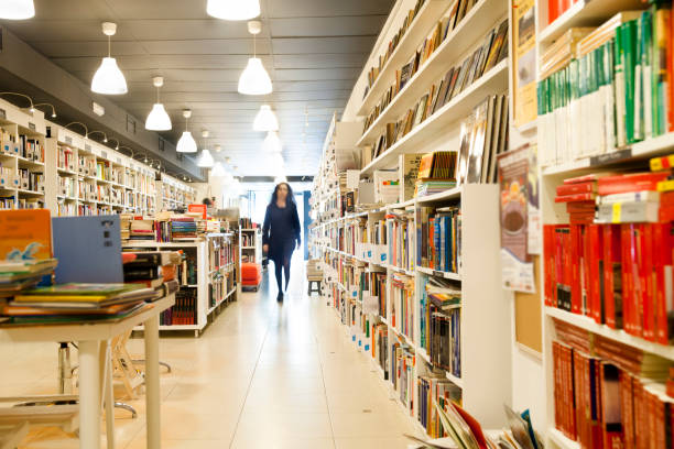 istock Restocking shelf in the bookstore 1352040834