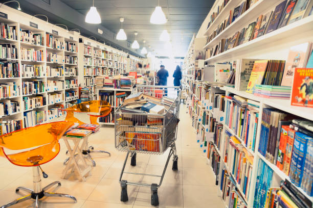 istock Restocking shelf in the bookstore 1352040869