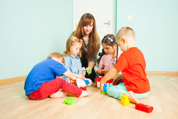 istock Friends And Son On Floor At Home 1352041427