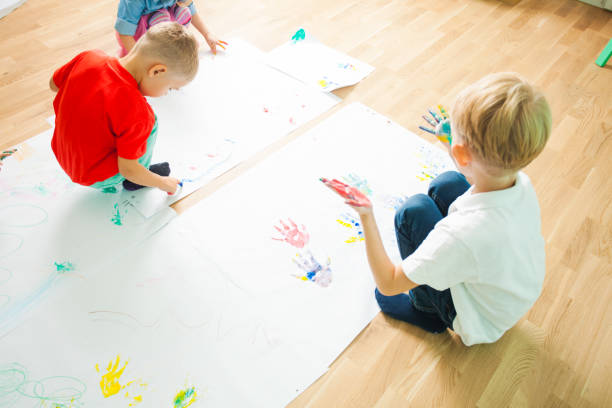 istock High Angle View Of Father And Son On Floor 1352041585