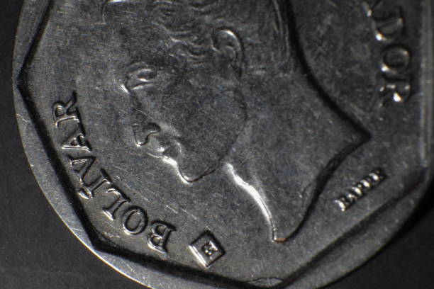 istock Venezuela Bolivar coin isolated on black background - set macro 1352046773
