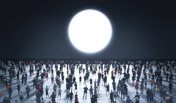 istock People look at big glowing circle. 1352048893