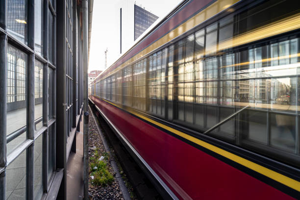 istock Blurred Motion Of Train At Railroad Station 1352053299