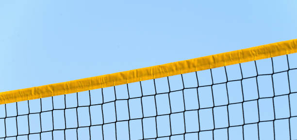 istock Beach volleyball net on a blue sky 1352055911