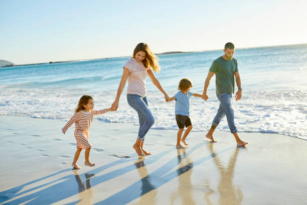 istock Family at beach during summer vacation 1352066774