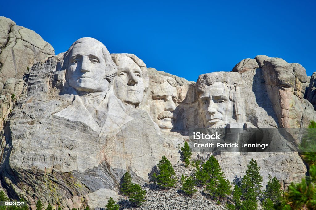 Mount Rushmore National Monument with clear blue skies in South Dakota. Mt Rushmore National Monument Stock Photo