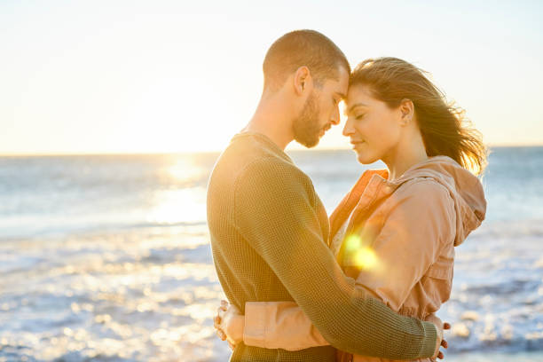 istock Romantic couple at beach during vacation 1352067870