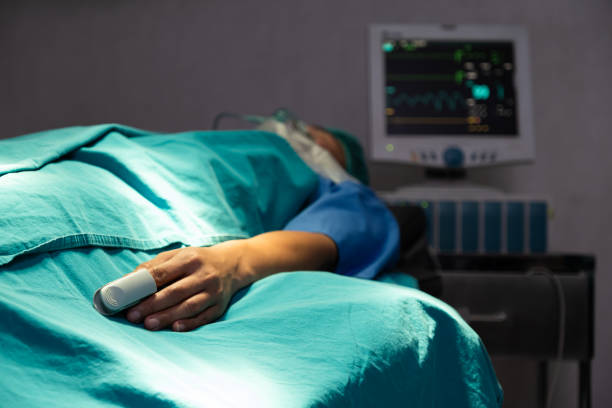 istock Selective focus at patient finger with pulse meter check while do surgery inside of the hospital. Emergency case for illness that need medial attention and monitoring. 1352069703