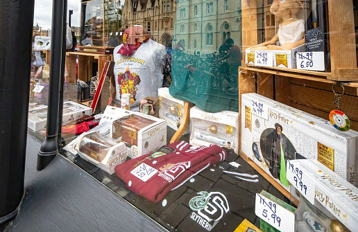 A huge variety of gifts, including games and tops, in a shop front in Oxford, Oxfordshire, England, UK.