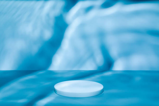 istock circle podium on blue background scene water waves shadows 1352071247