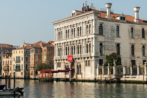 Venice, Italy - October 31, 2021: Old palace on the Canale Grande in Venice, sunny day in autumn, casino