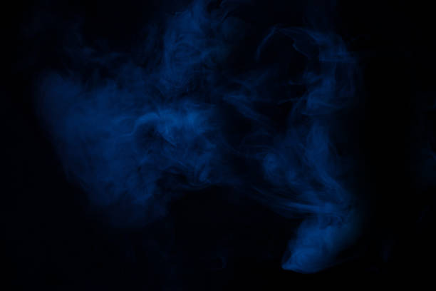istock Blue and pink steam on a black background. 1352074438