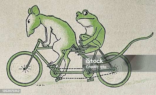 istock Mouse and frog cycling on a tandem, side view 1352075142