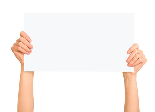 istock female hands holding sign 1352075858