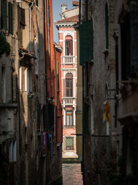 Narrow canal in Venice Narrow canal in Venice (Italy) on a sunny day in autumn, palace at canale grande in background venice italy grand canal honeymoon gondola stock pictures, royalty-free photos & images