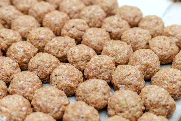 Raw meatballs ready to cook