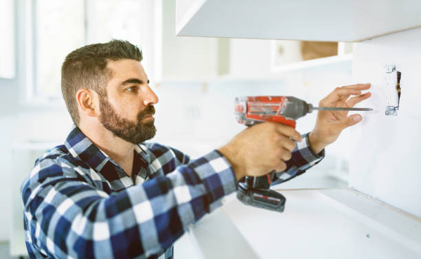 istock Portrait of an electrician happy worker at work 1352080203