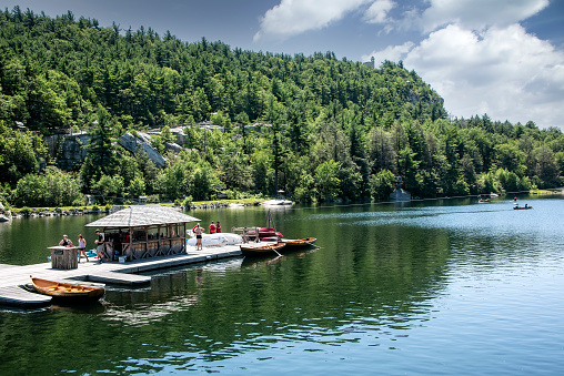 New Paltz, New York - July 11, 2015:  Guests of Mohonk Mountain House on the Boat Dock, to rent paddle boats on Mohonk Lake.