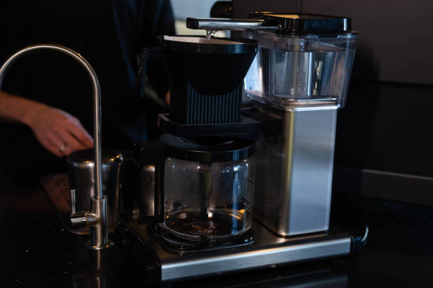istock Coffee maker with glass jug of coffee. filter coffee machine. alternative coffee making 1352080554